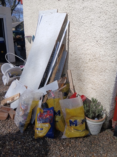 bathroom renovation waste in garden