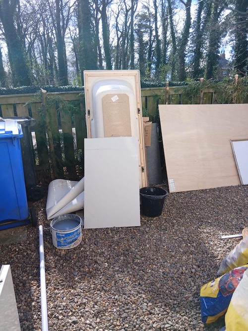 bathroom renovation waste in garden